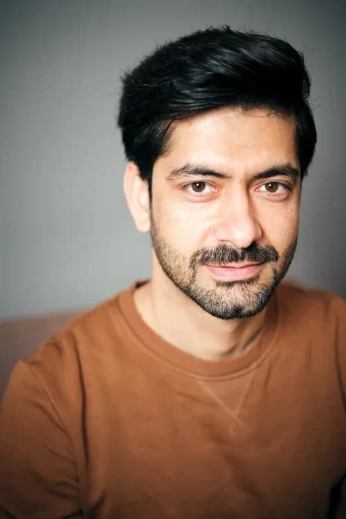 Portrait of a man in a brown shirt